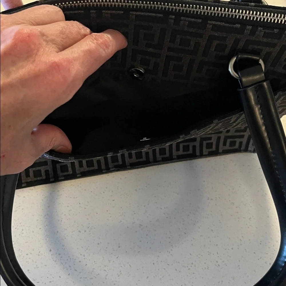 Fiorelli women's Vanessa Satchel in black geo jacquard.